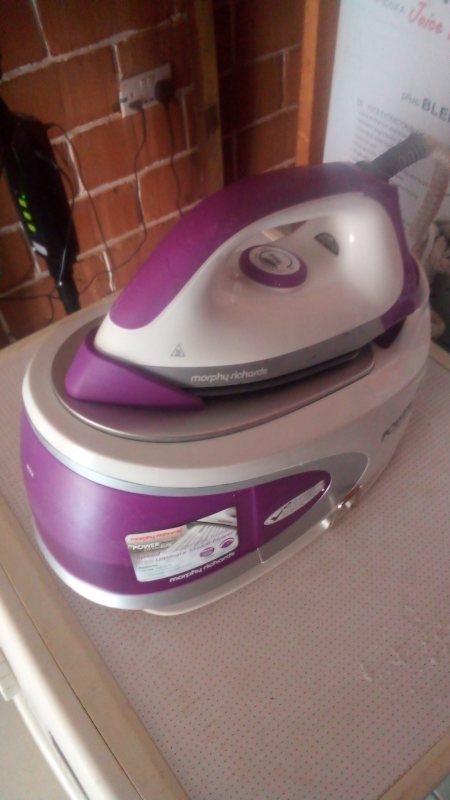 Industrial steaming iron